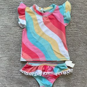 Feather 4 Arrow striped bathing with flutter sleeves and ruffle bottom NWT